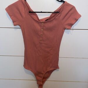 Dark pink short sleeve body suit